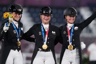 Germany’s Dorothee Schneider, Isabell Werth and Jessica von Bredow-Werndl celebrating Dressage team gold at the Tokyo 2020 Olympic Games in Baji Koen Equestrian Park today. (FEI/Shannon Brinkman) Germany’s Dorothee Schneider, Isabell Werth and Jessica von Bredow-Werndl celebrating Dressage team gold at the Tokyo 2020 Olympic Games in Baji Koen Equestrian Park today. (FEI/Shannon Brinkman)
